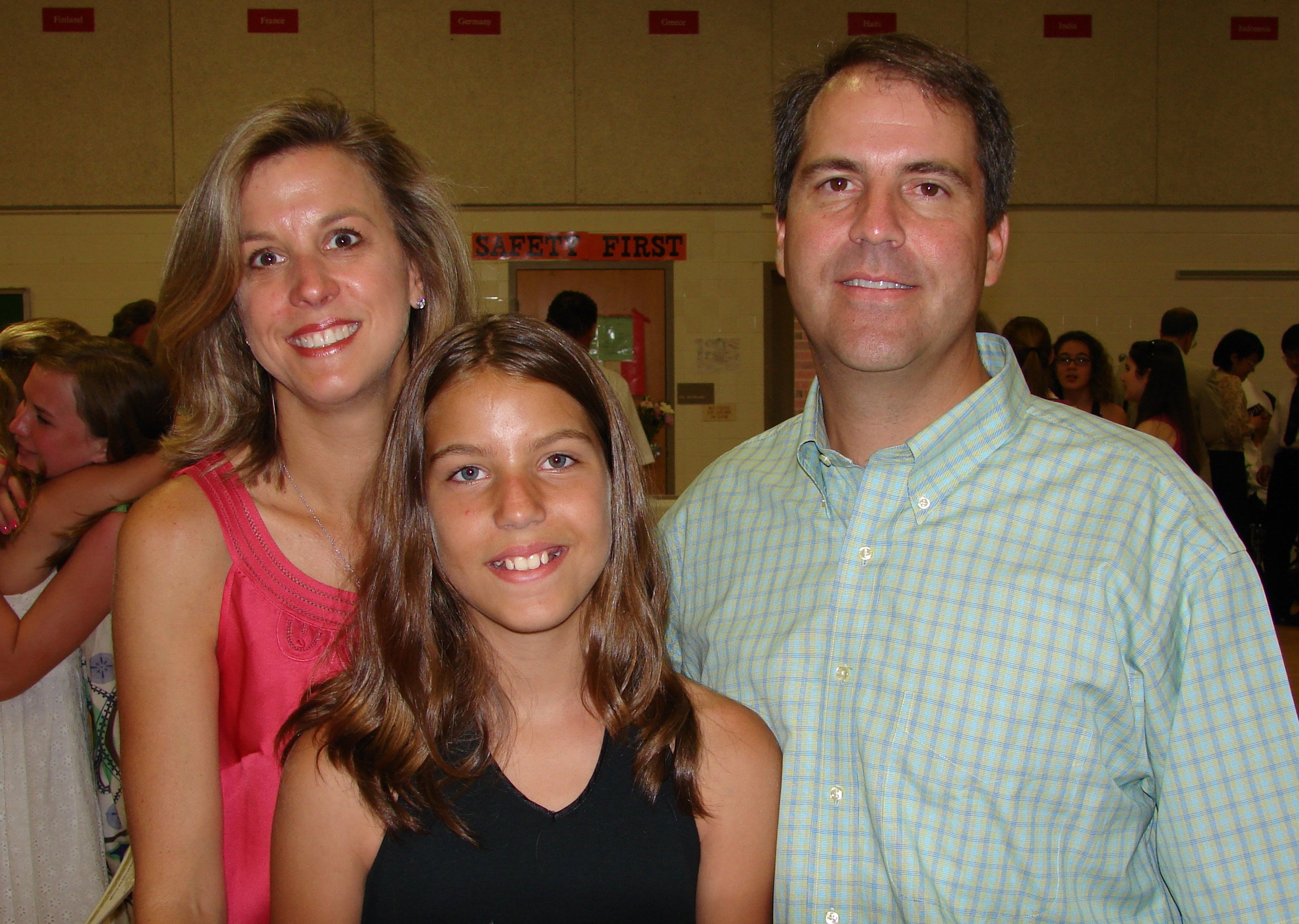 0608 Ava Graduation Mom Dad.jpg