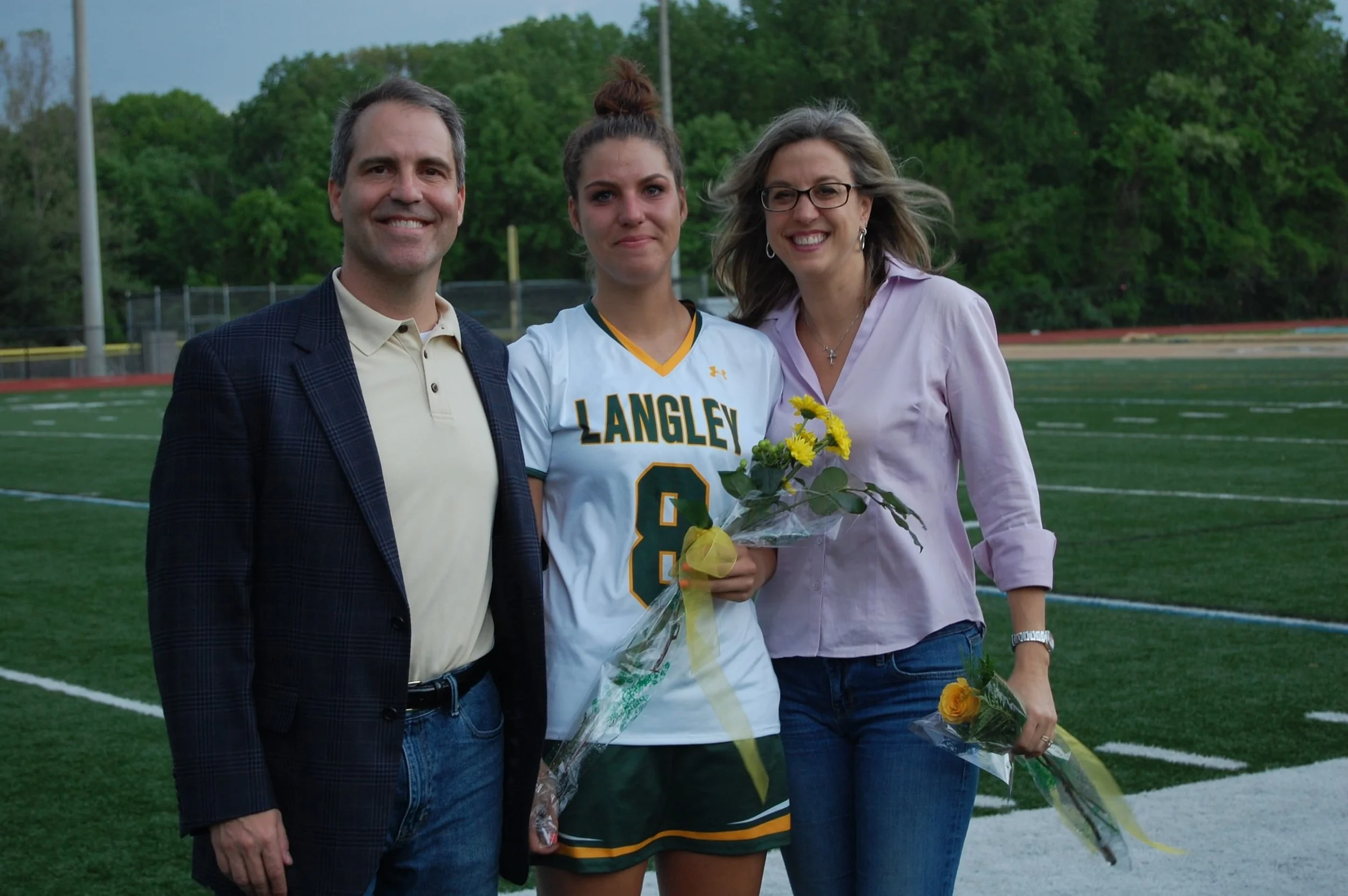 0514 Ava LAX Senior Night Mom Dad 2.jpg
