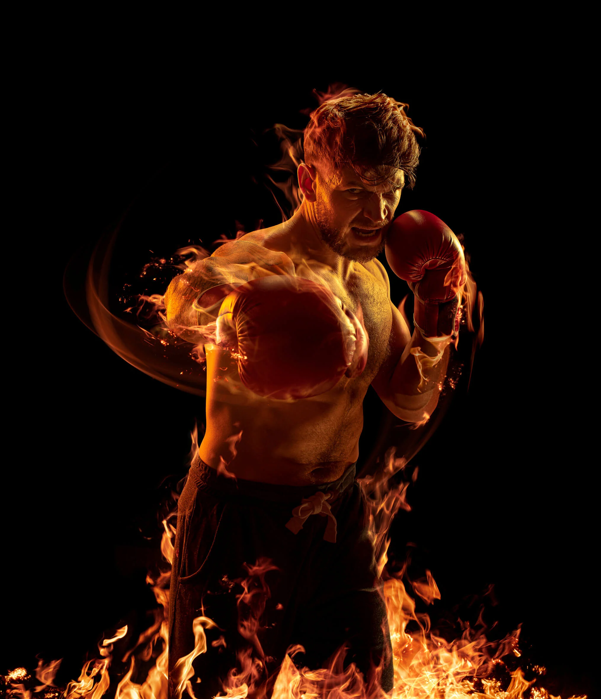 A creative studio portrait of a boxer