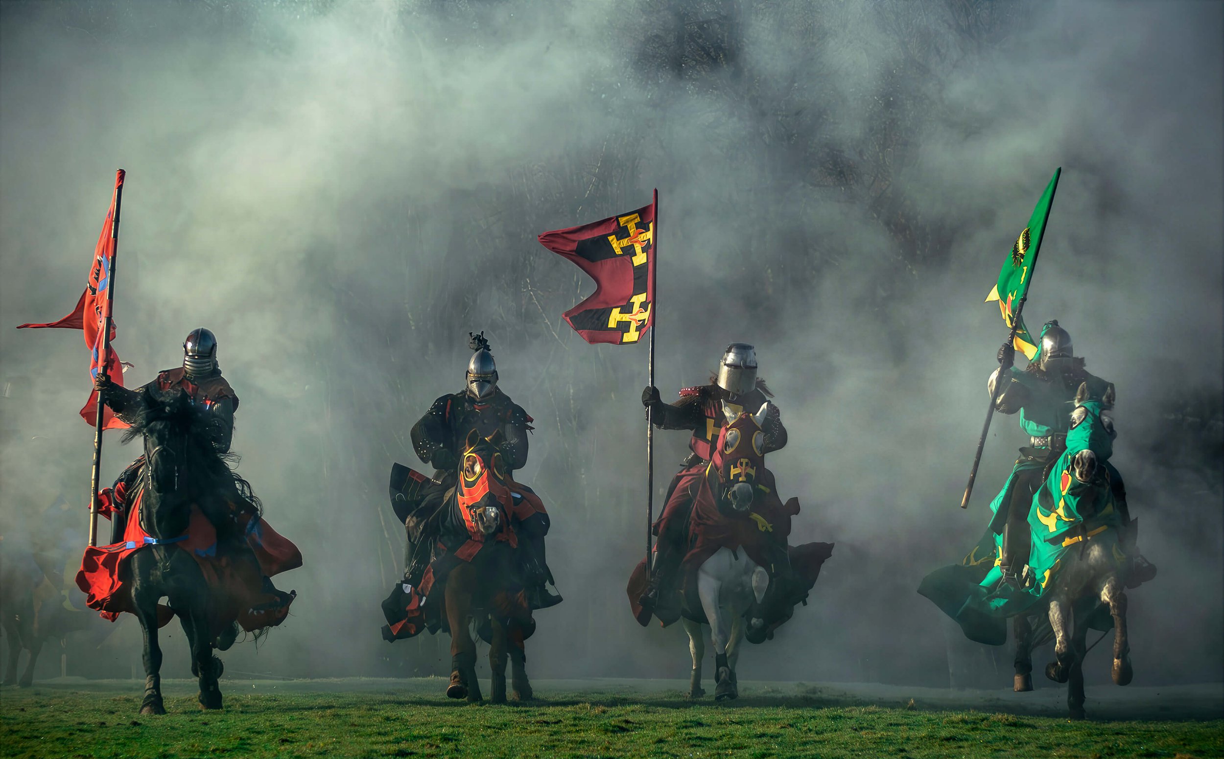 medieval knights riding on horseback