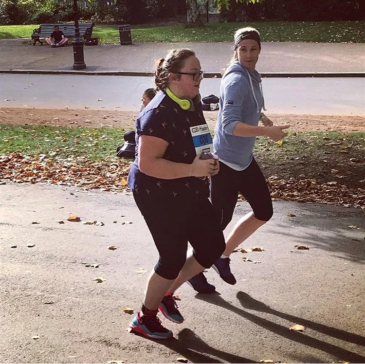 Personal trainer with her client