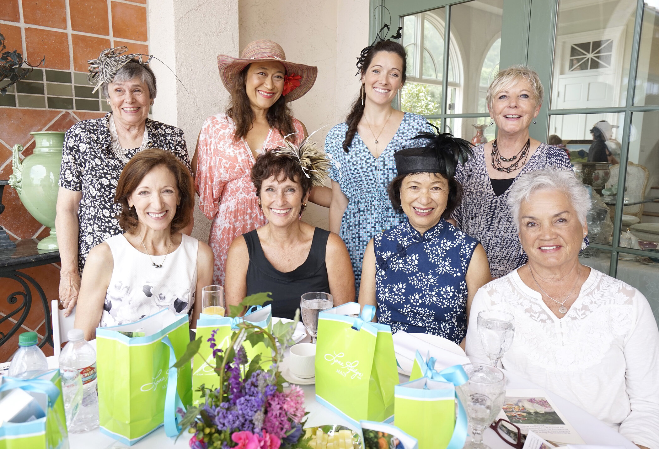  High tea guests (pictured from left): (top row) Suzanne George, Mei Li Coon, Jenny Coon, Paula Heiskell; (bottom row) Cindy Sawyer, Nutie Keogh, Lynn Coon, Sonia Phillips. 