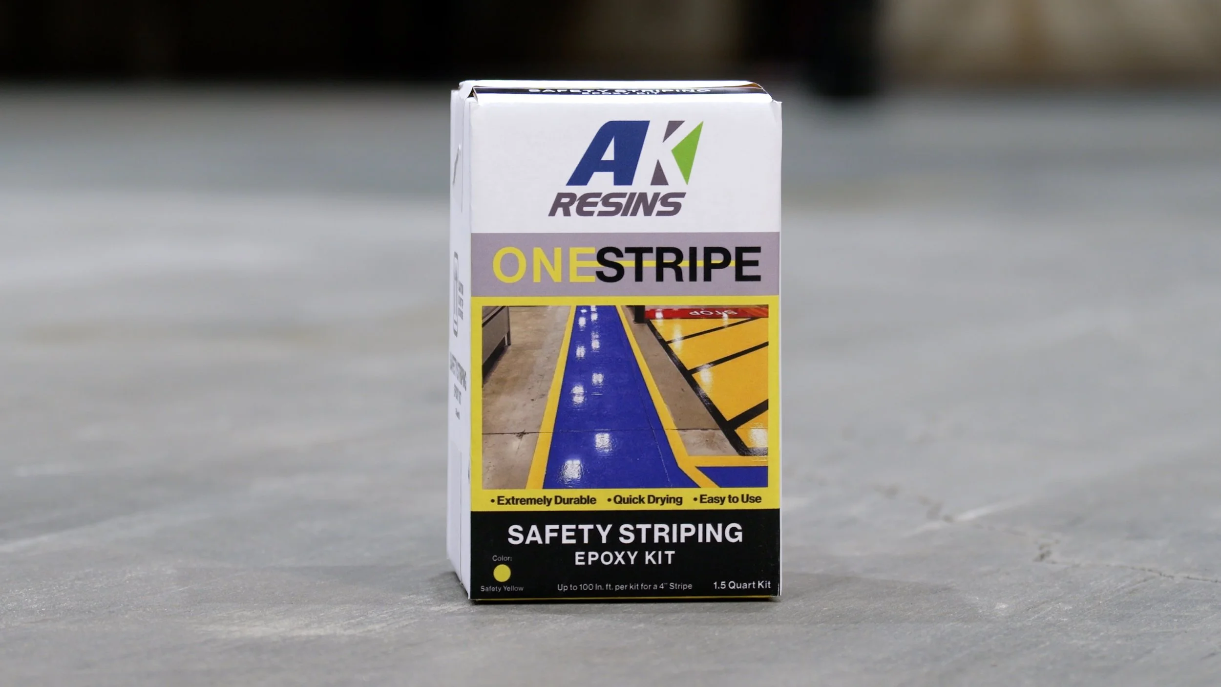 OneStripe easy to use safety striping epoxy kit in a warehouse