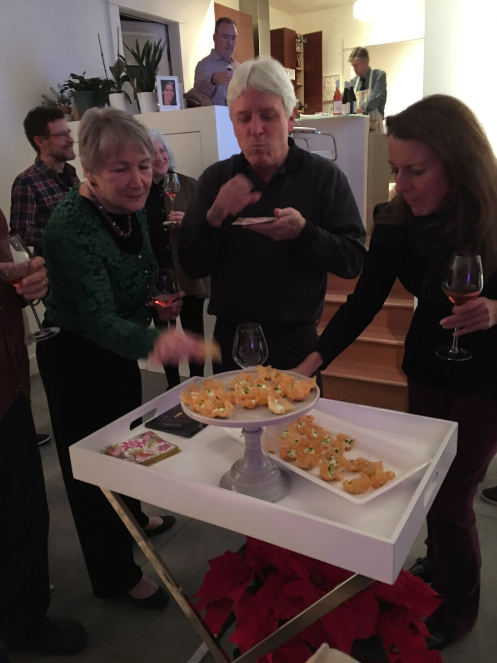 guests enjoying appetizers in the salon