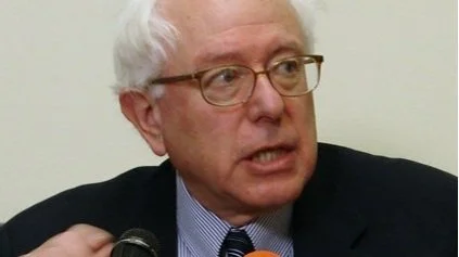 Pay attention to Bernie Sanders while he warns against America’s new ruling class and its major trait: Naked greed