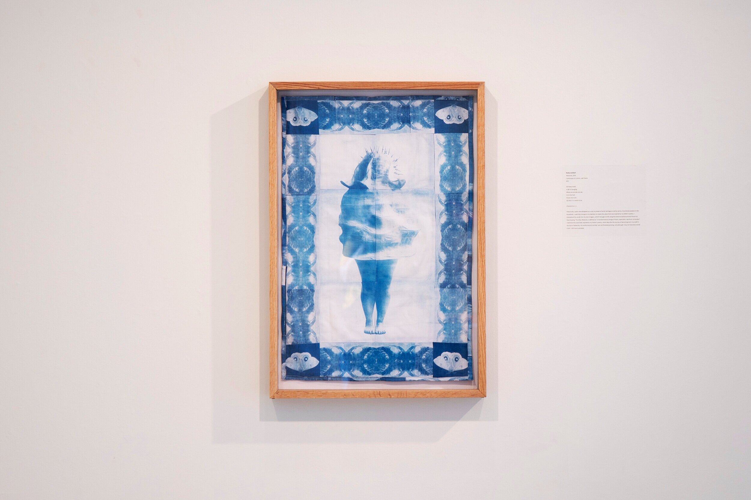   Metanoia  , 2019.  Quilted cyanotypes on cotton, oak frame. 