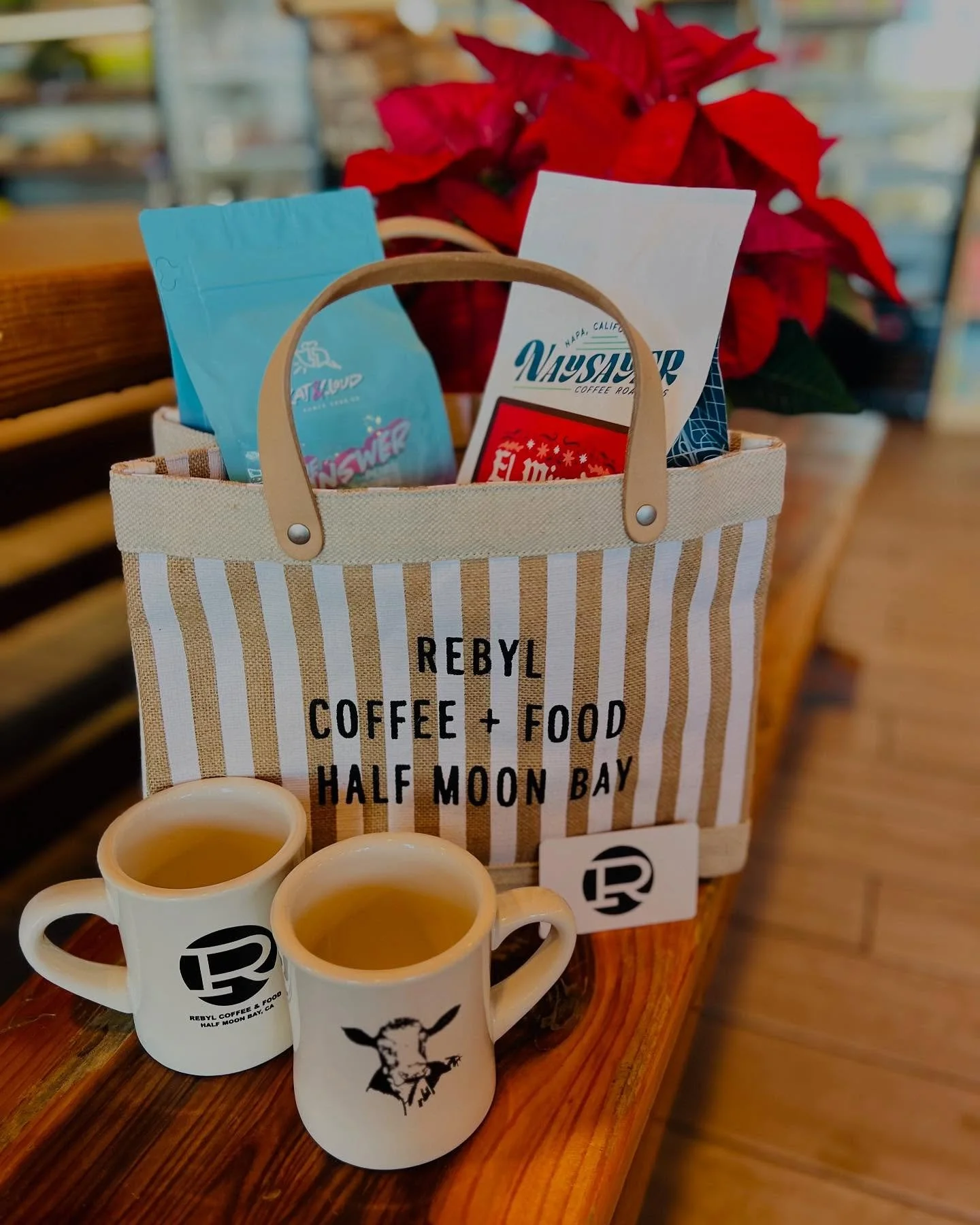 We are fully stocked with our signature striped totes, a great selection of premium craft coffees, GIFT CARDS, and of course those mugs everyone keeps asking about.

So pop in, say hi and get some of your holiday shopping done while sipping on a perf