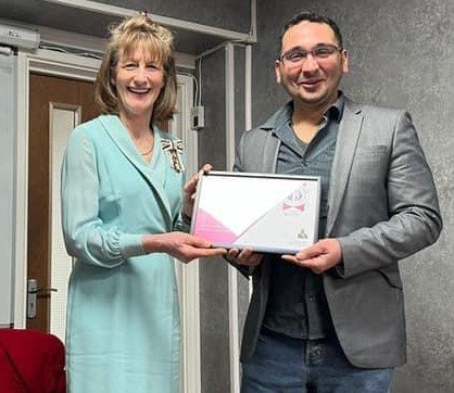 Adam honoured for charity work