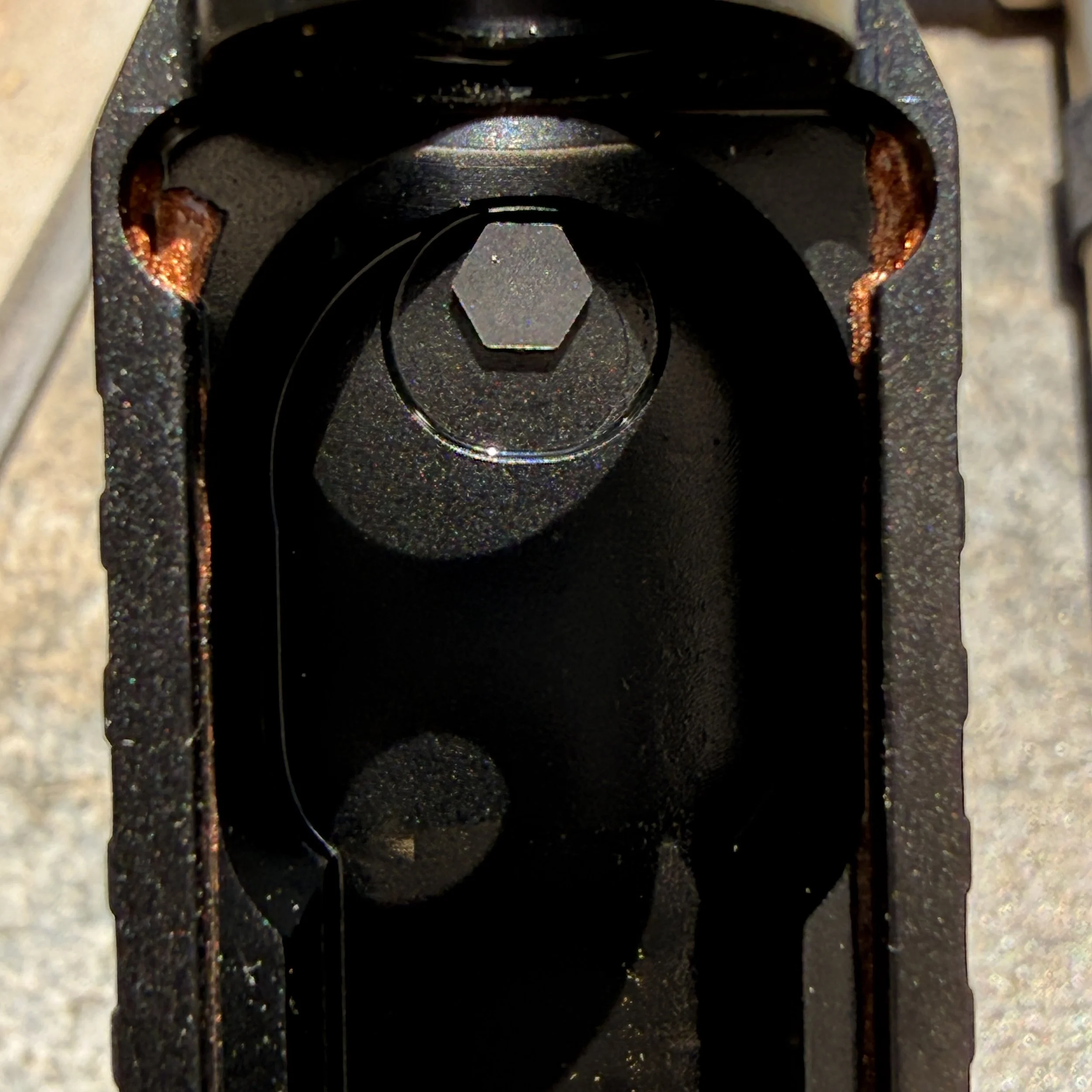 Glock front sights are held in place with a small screw that needs a special tool to replace. 