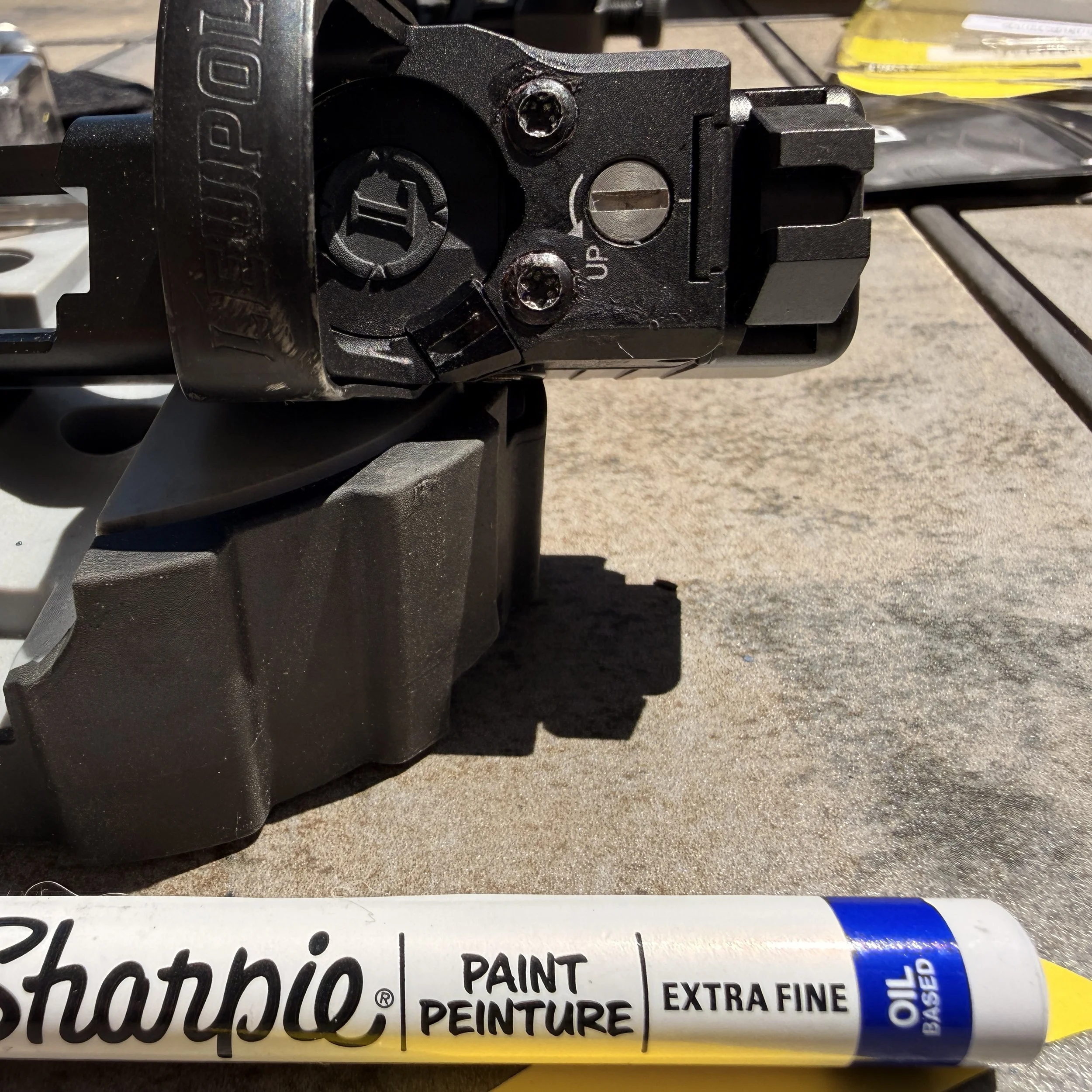 An extra-fine, oil-based paint pen is the last tool needed for the optic install. 