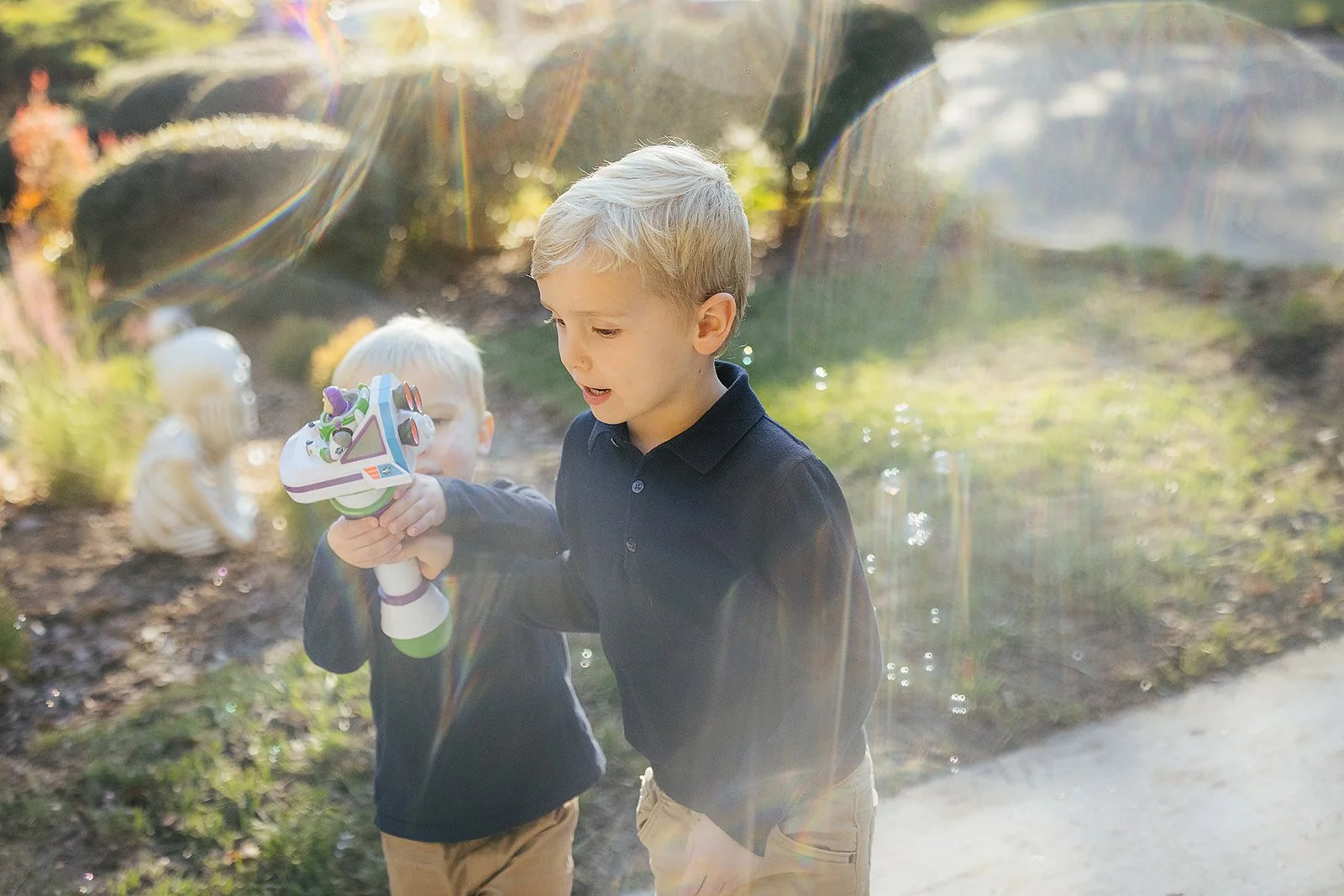 BrothersPlayingWIthBubblesOutside