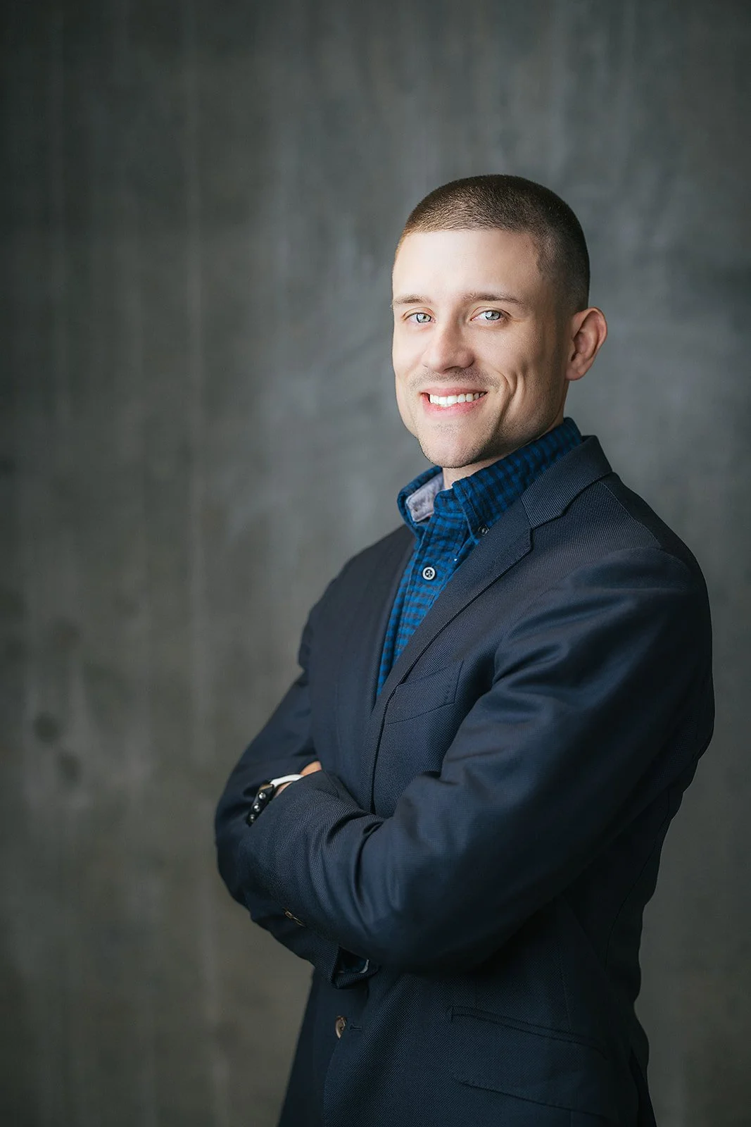 Man with Crossed Arms in Corporate Headshot