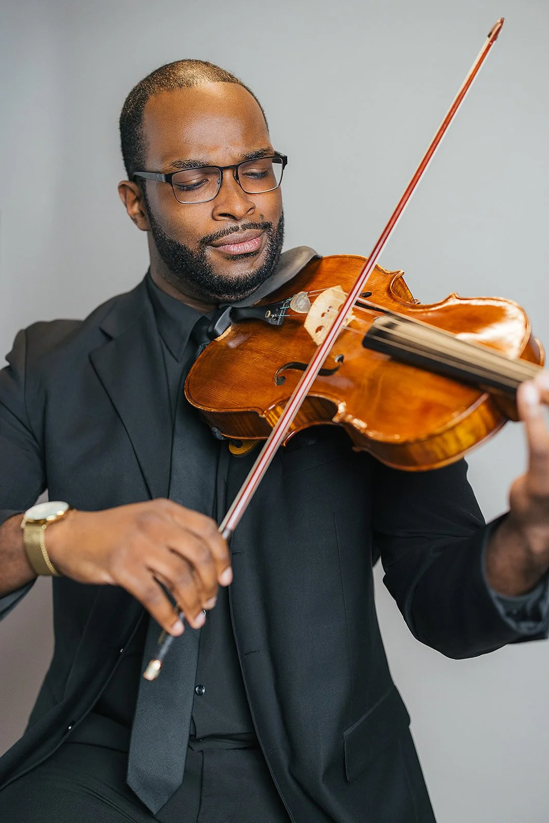 Man Playing Violin During Branding Photography Session