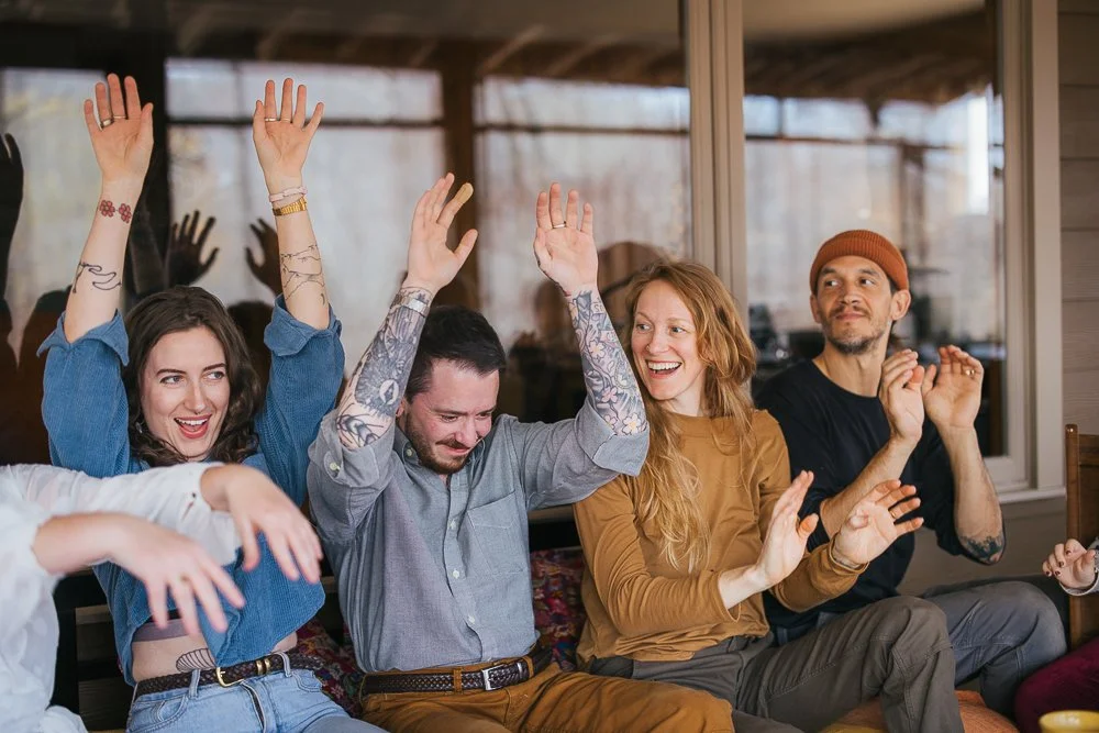 Friends Cheering and Laughing In-Home Family Photography Session