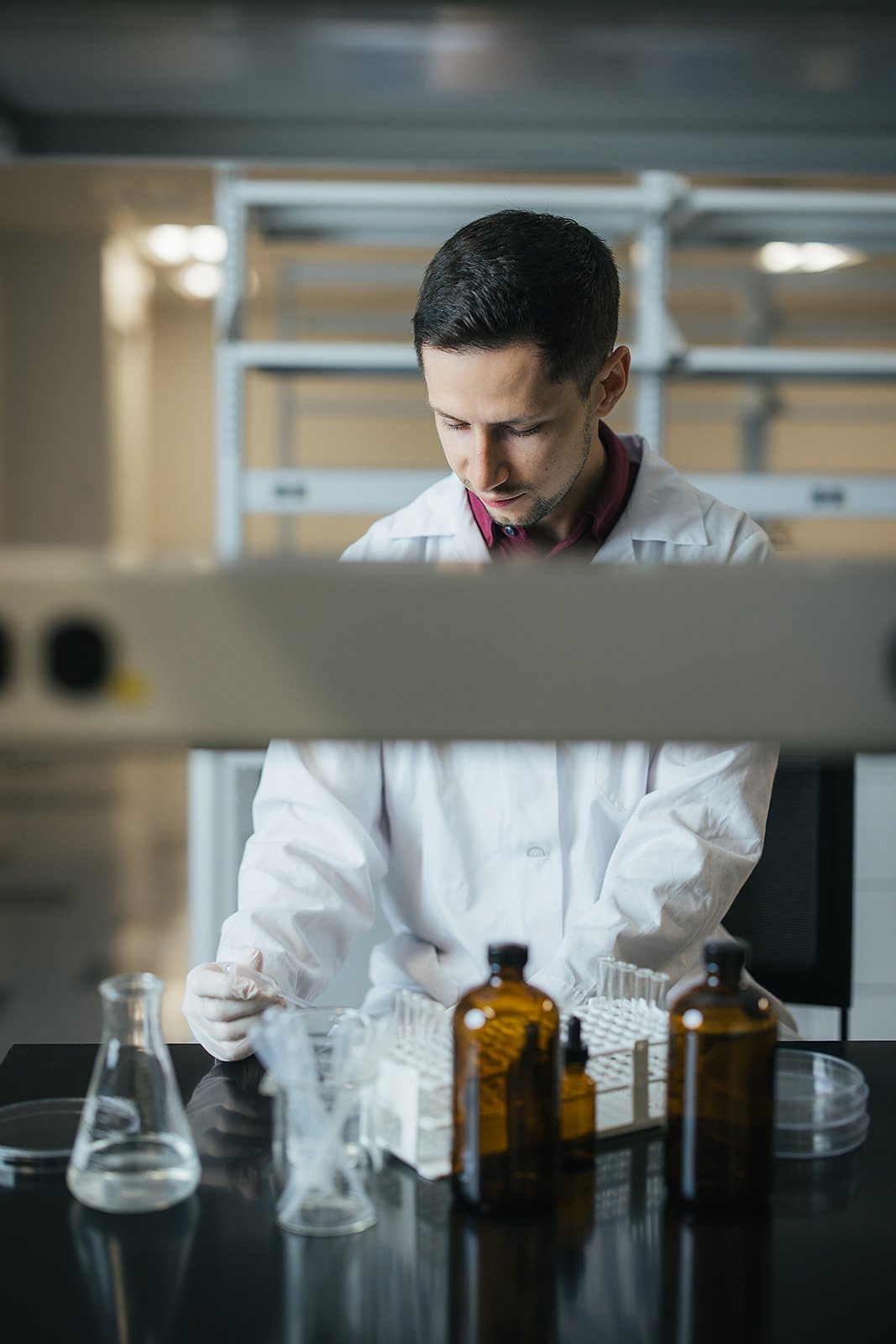 ManInWhiteLabCoatWorkingInLab