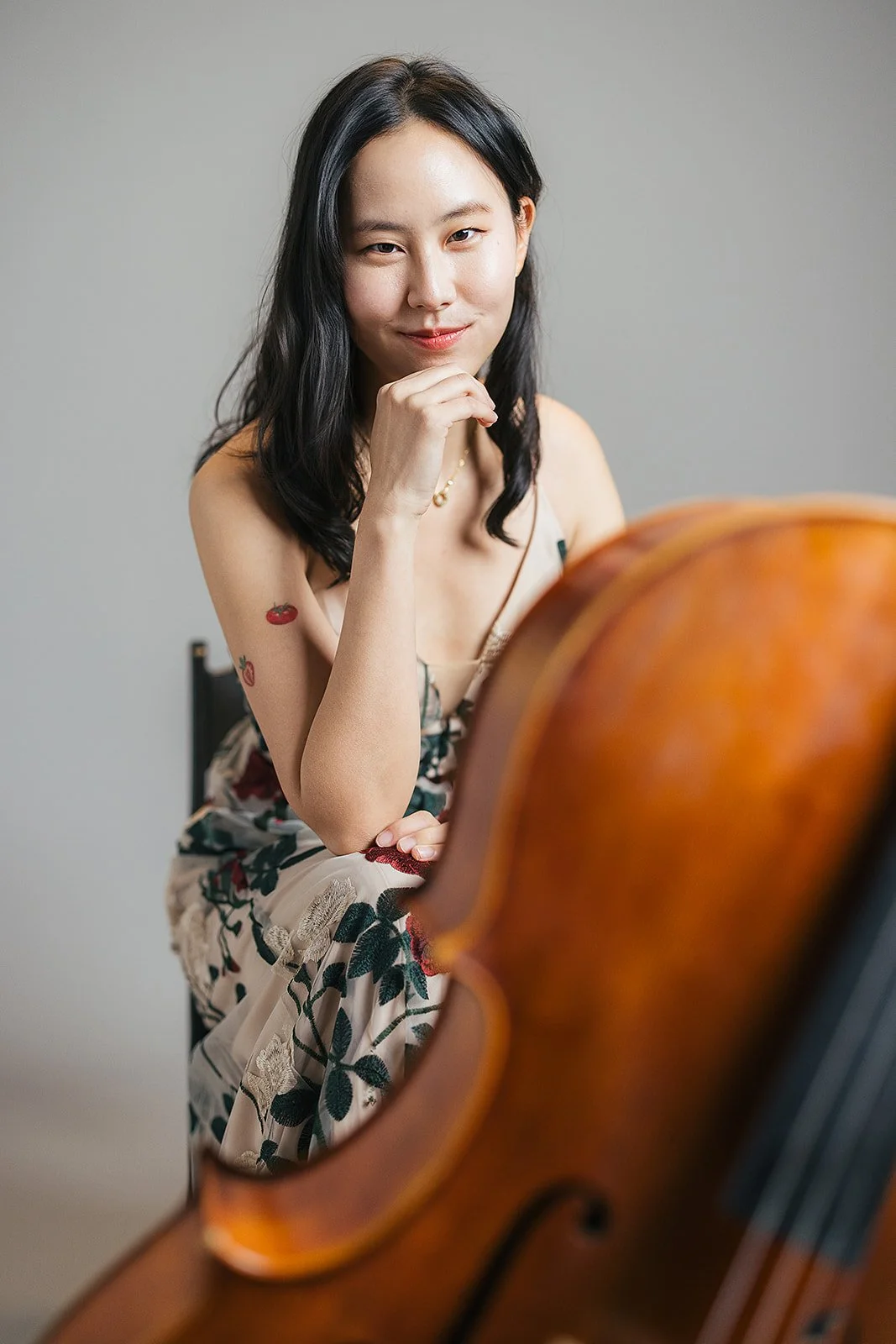 Woman Posing with Cello Chamber Orchestra of the Triangle Branding Photography Session