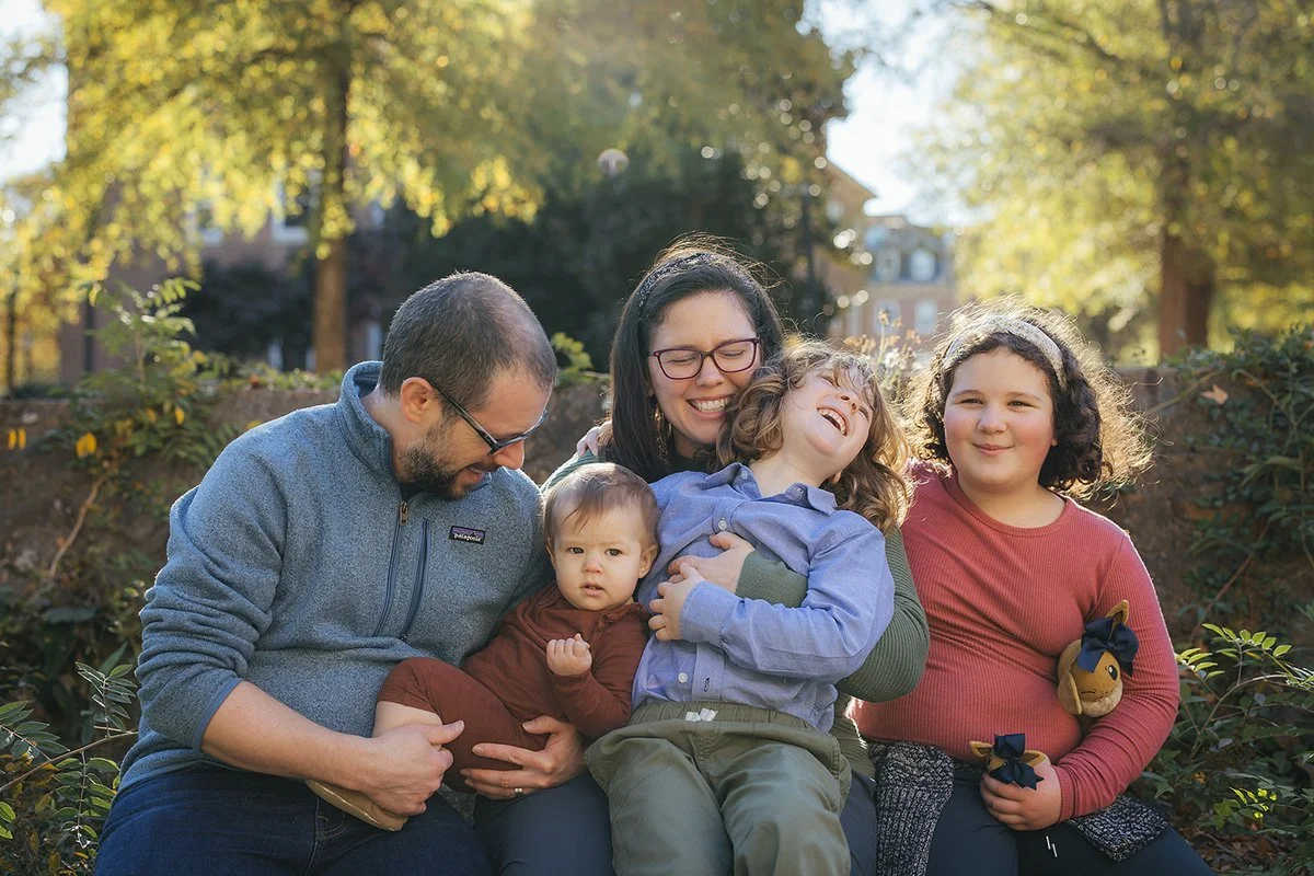 Chapel Hill family in the dappled light of Battle Park