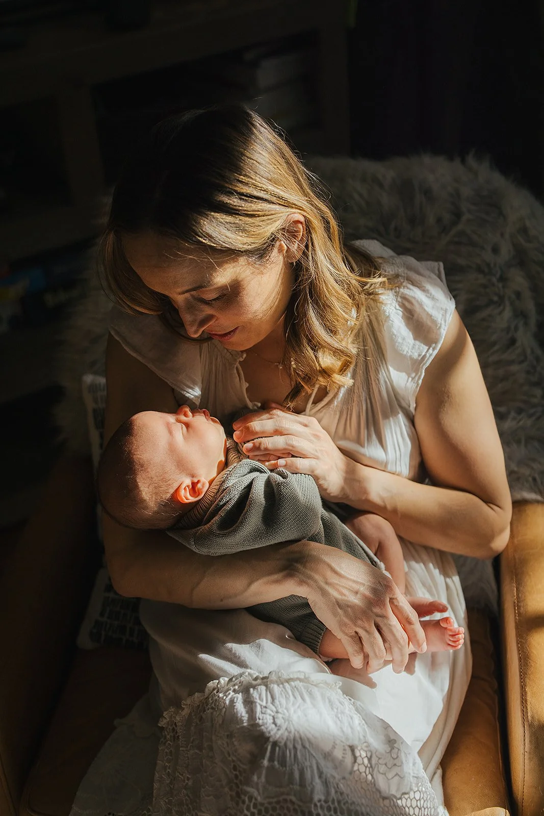 Sweet Blond mother and baby moment in a Durham NC Newborn Photo Session