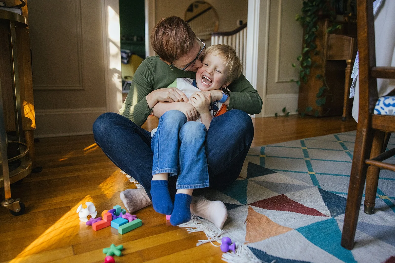 Mom and Son Laughing and Playing Together