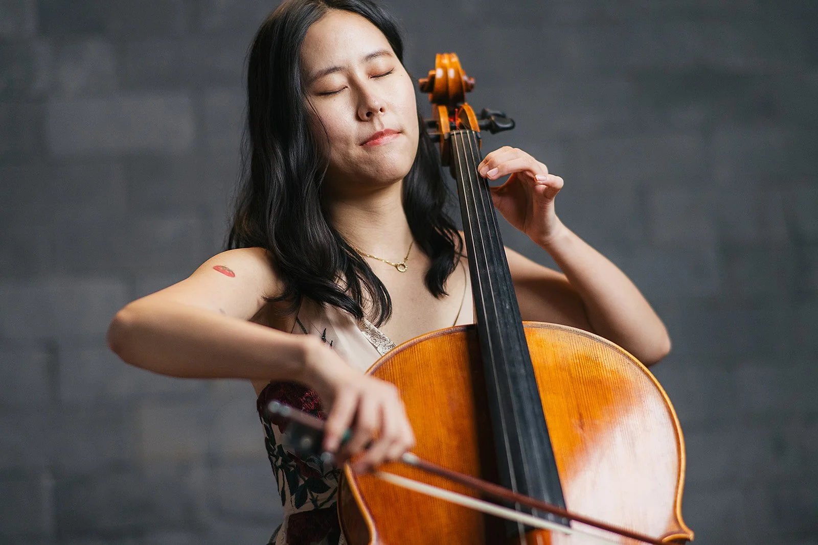 Member of Chamber Orchestra of the Triangle Playing the Cello
