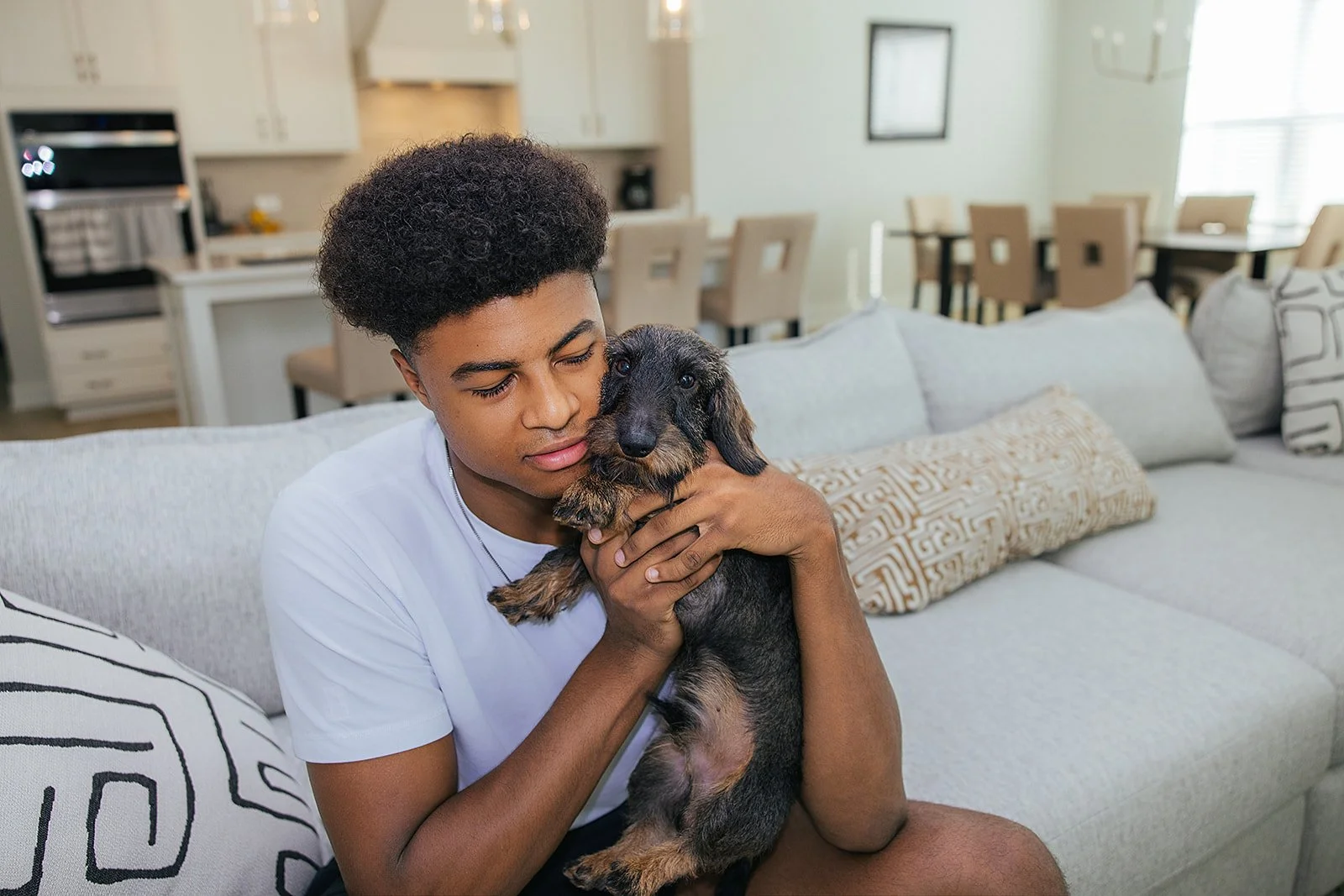 Duke basketball player in home done by AFR Furniture Rental in a Durham home