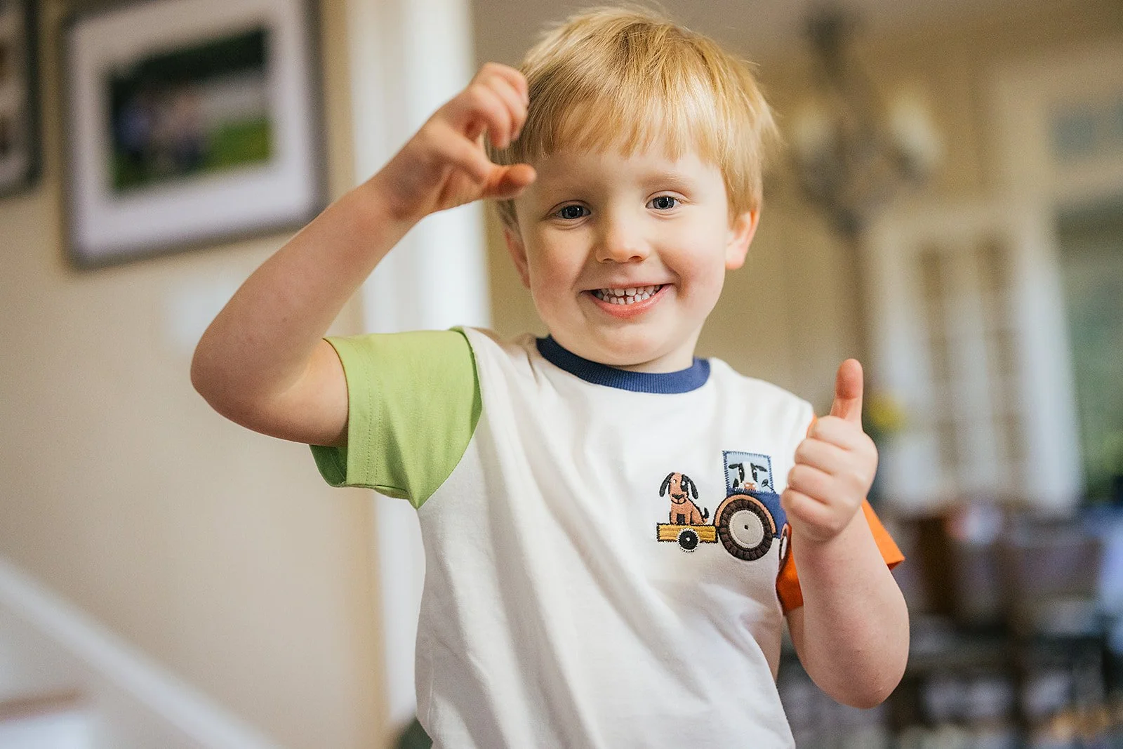 Young Boy Being Silly During Family Photo Session