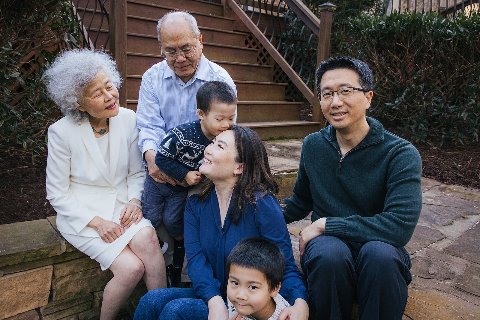 Extended family photo outside family home in Durham NC