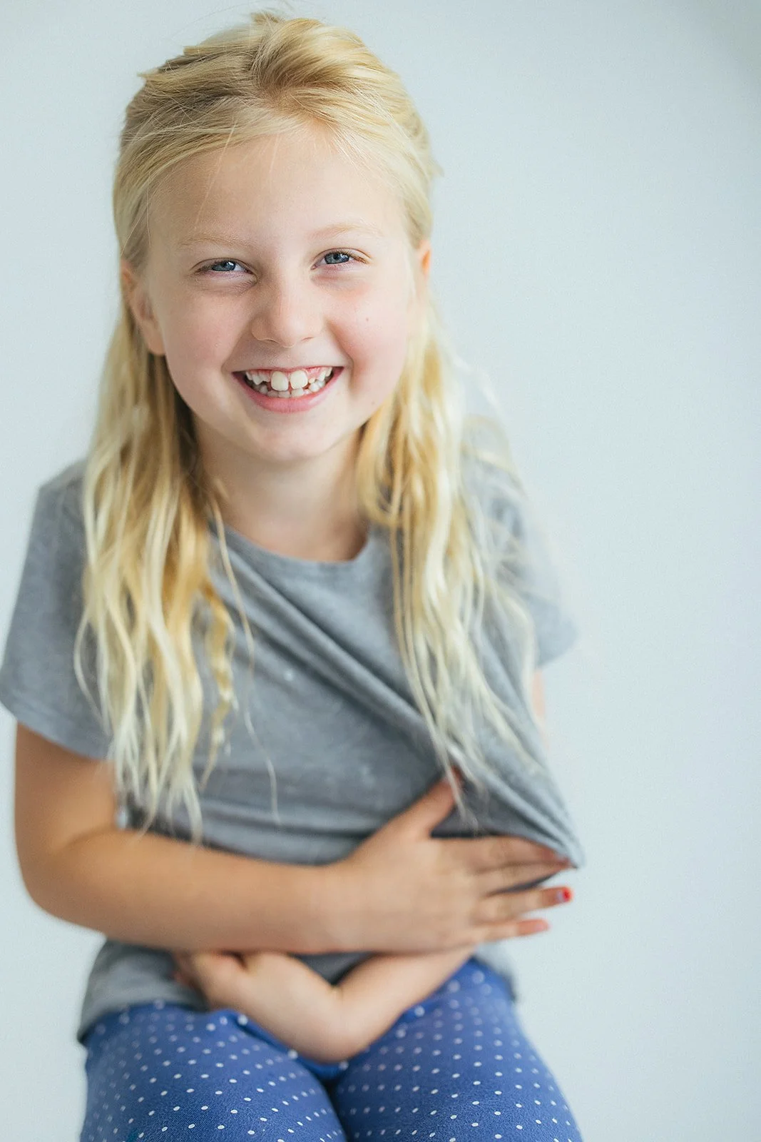 Young Girl in Grey Shirt Portrait Session in Studio