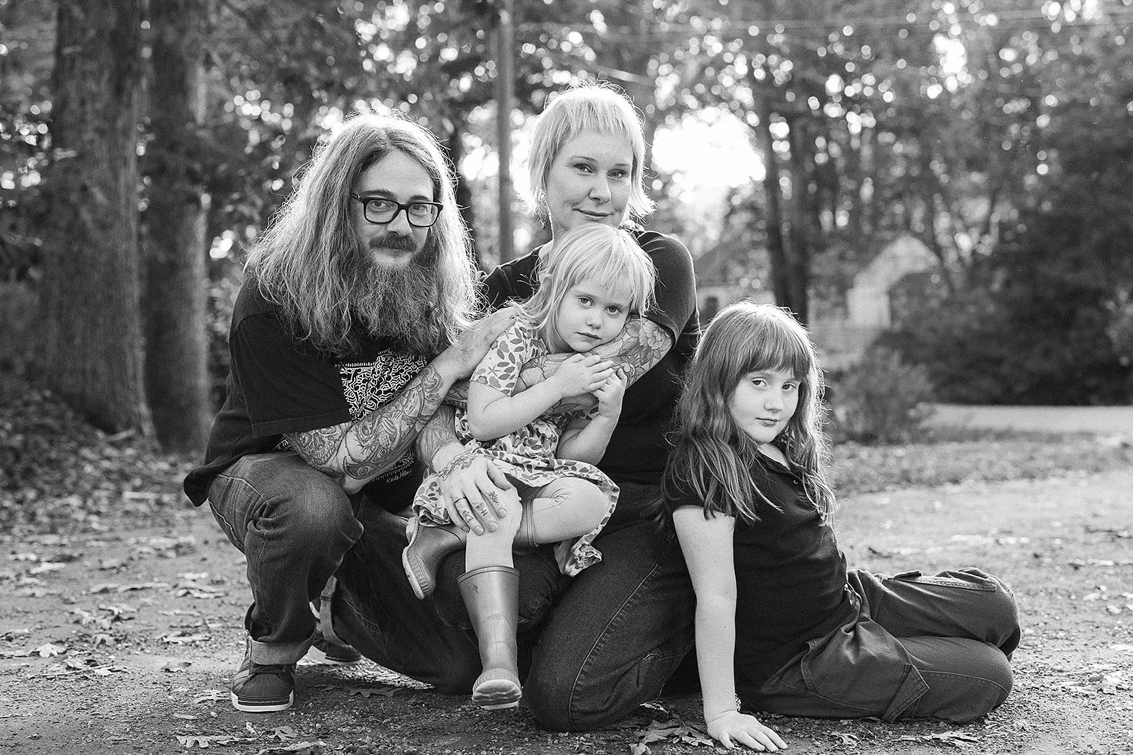 Black and White Photo of Family of Four During Family Photo Session