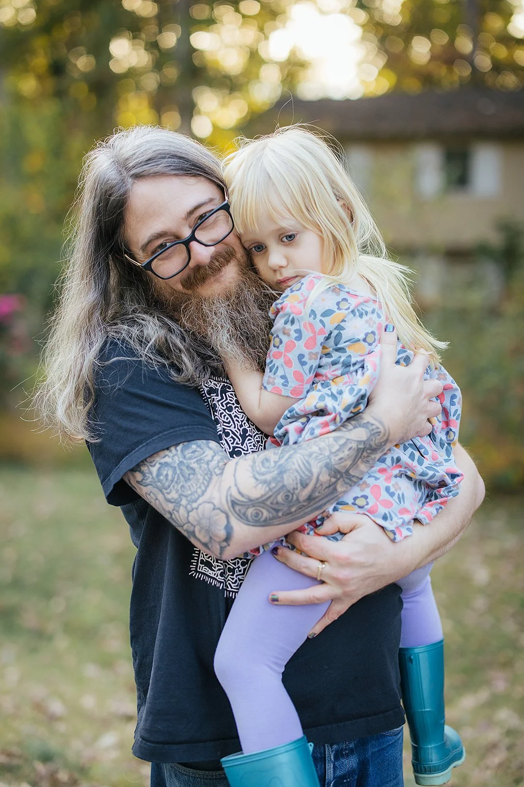 Dad Holding Young Daughter Family Photography Session