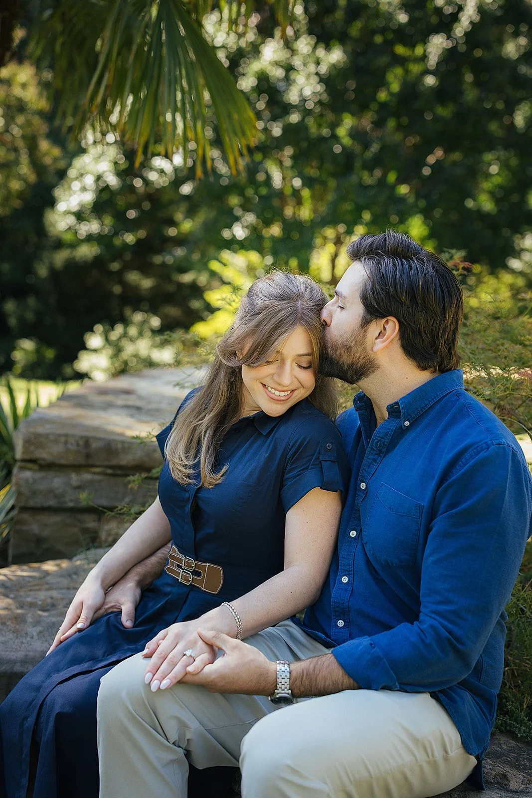 Man kissing womans head Sarah P Duke Gardens Durham NC