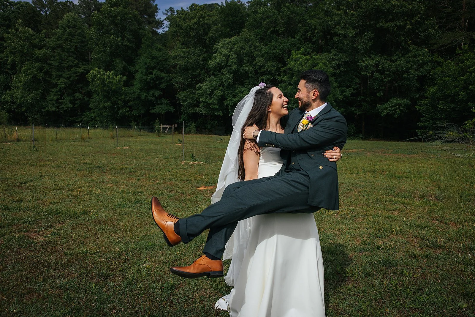 Candid wedding photography Durham NC — couple celebrating