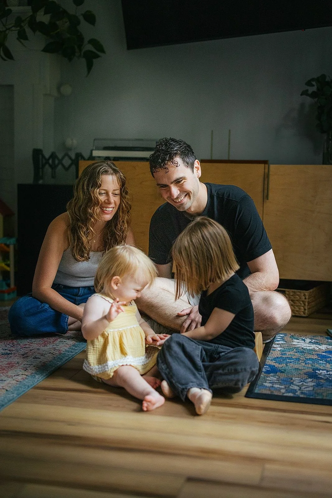 Family Playing Together on Floor During At-Home Family Photography Session