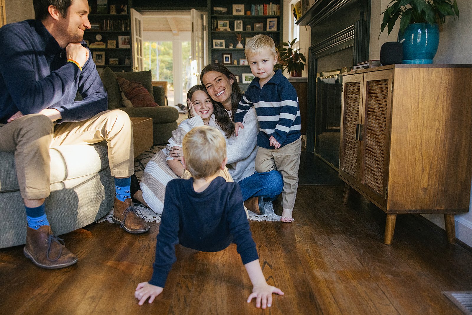 FamilyPlayingTogetherInLivingRoomChapeljHillNC