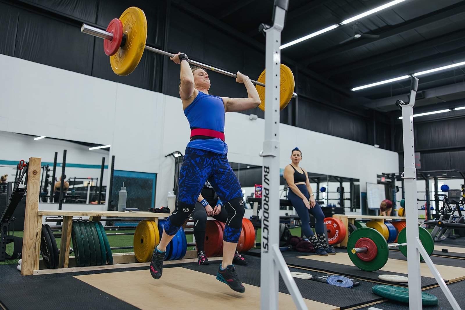 heavy weight lifting demonstration at Durham, NC wellness center for local business photography
