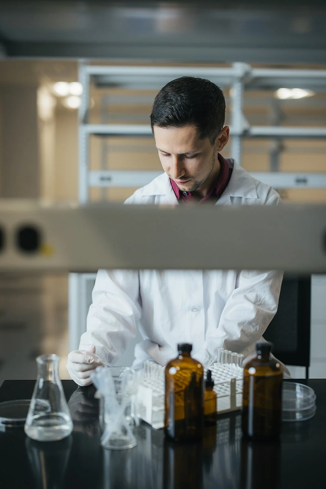 ManInWhiteLabCoatWorkingInLab