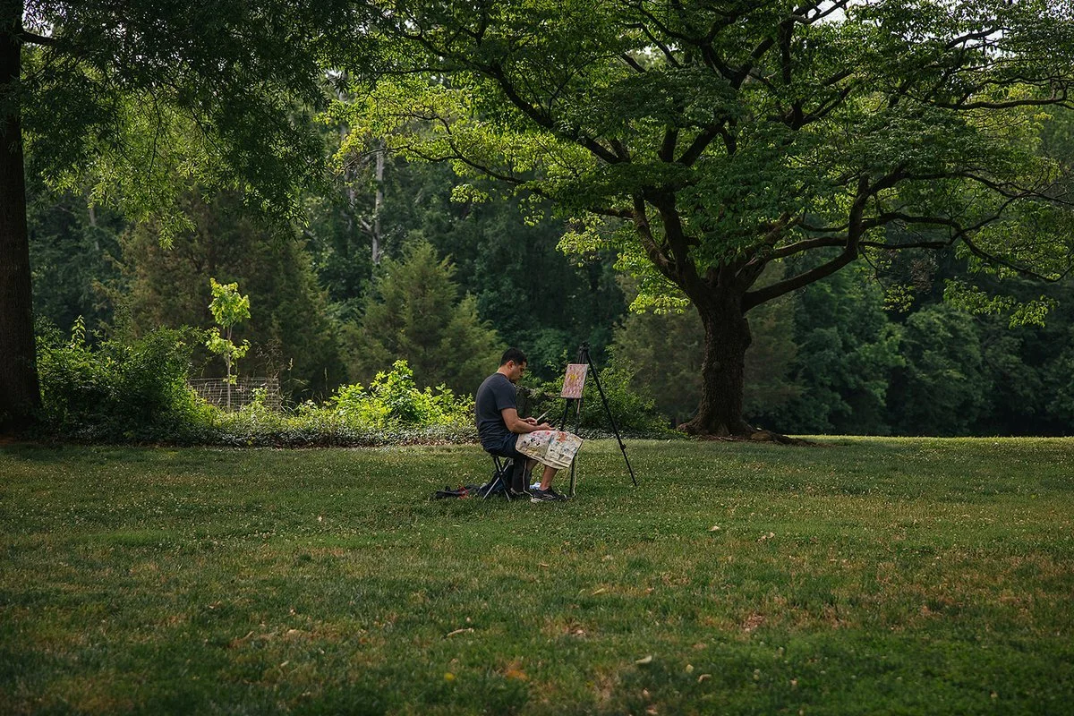 Man Painting in the Fields at Blackwood Farm Park Chapel Hill