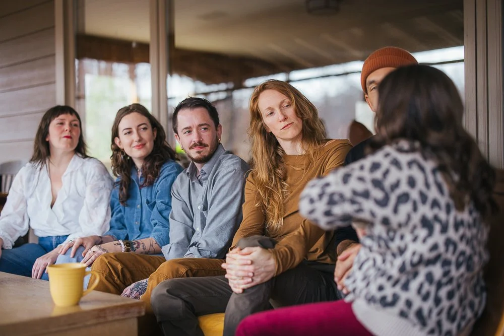 Friends Sitting on Outdoor Couch in Durham NC