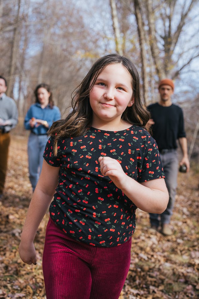 Young GIrl Running Through Woods in Durham NC