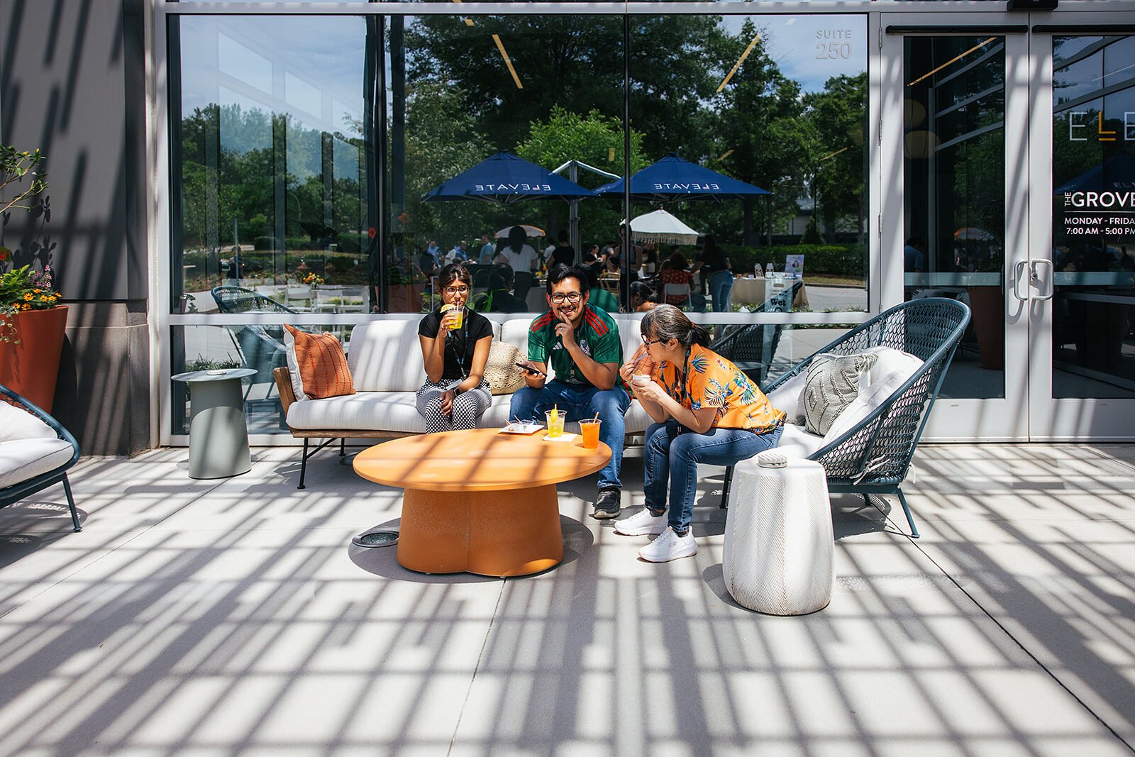 Event Attendees Sitting Outside Chatting Raleigh Event Photography
