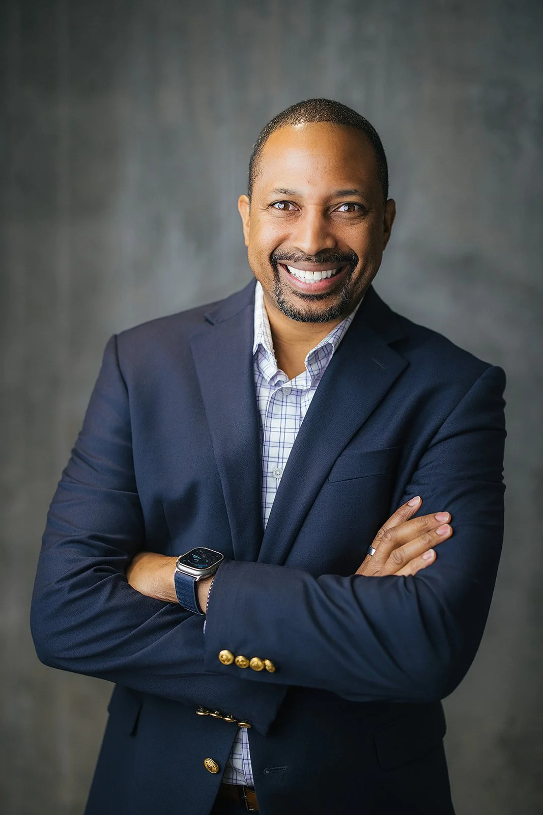 Man Smiling Arms Crossed Corporate Headshot