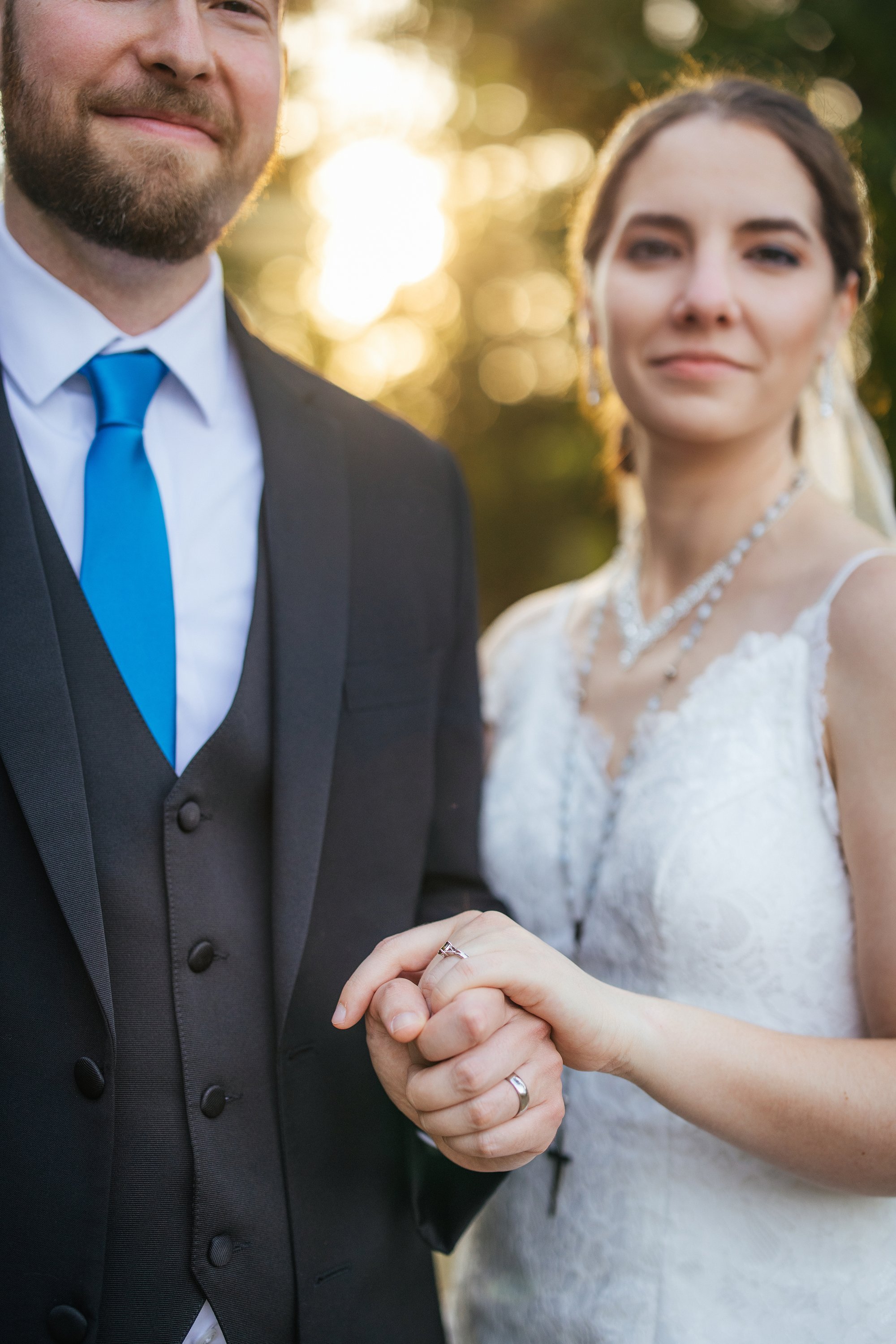 Bride with lace veil and rosary necklace — Chapel Hill wedding photography