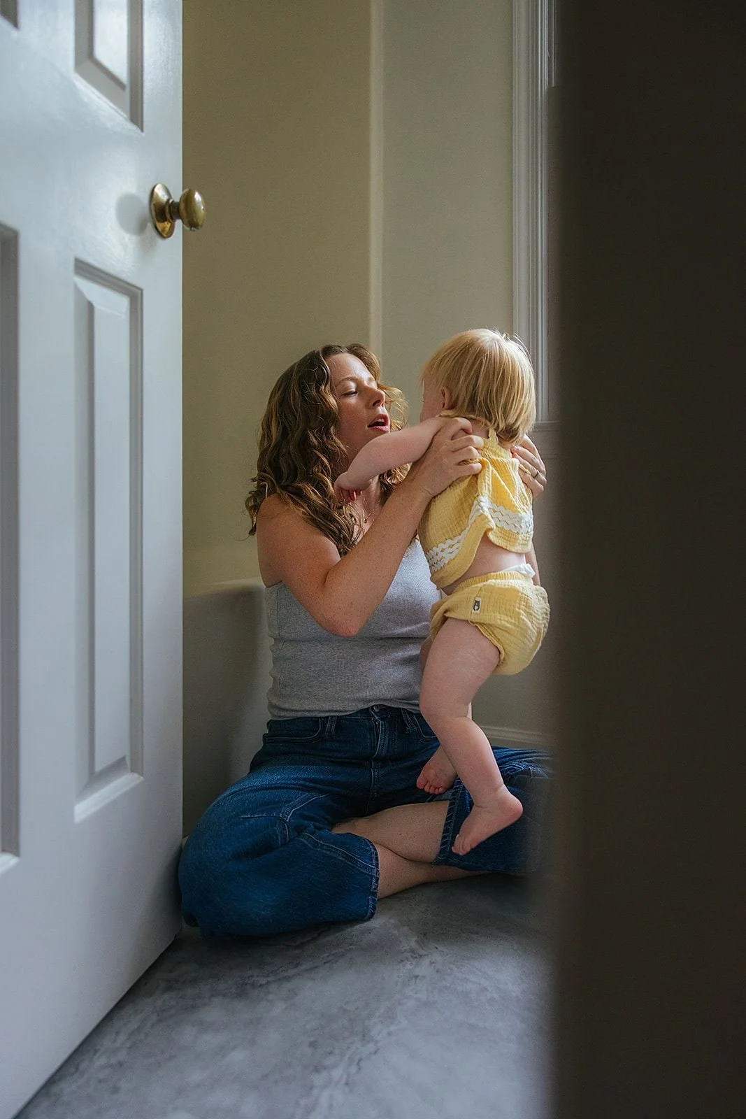 Mom Playing with Young Daughter During In-Home Family Photography Session