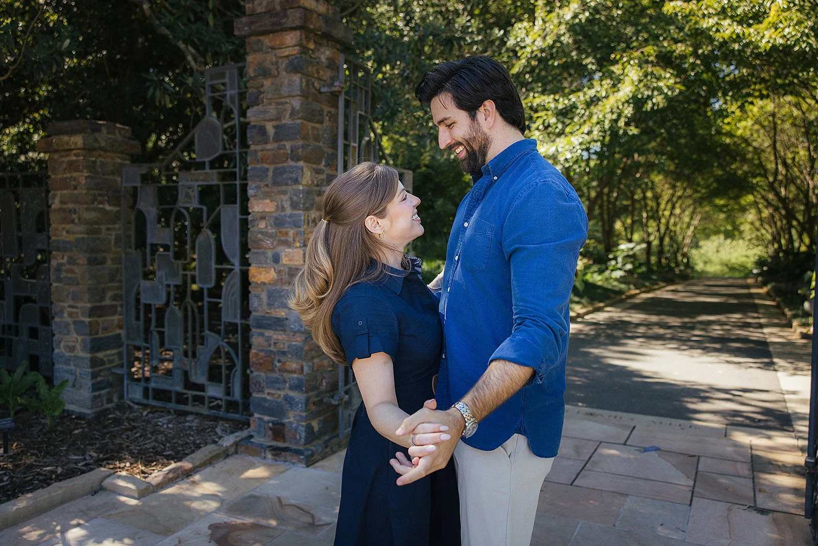 Couple smiling and holding hands Sarah P Duke Gardens