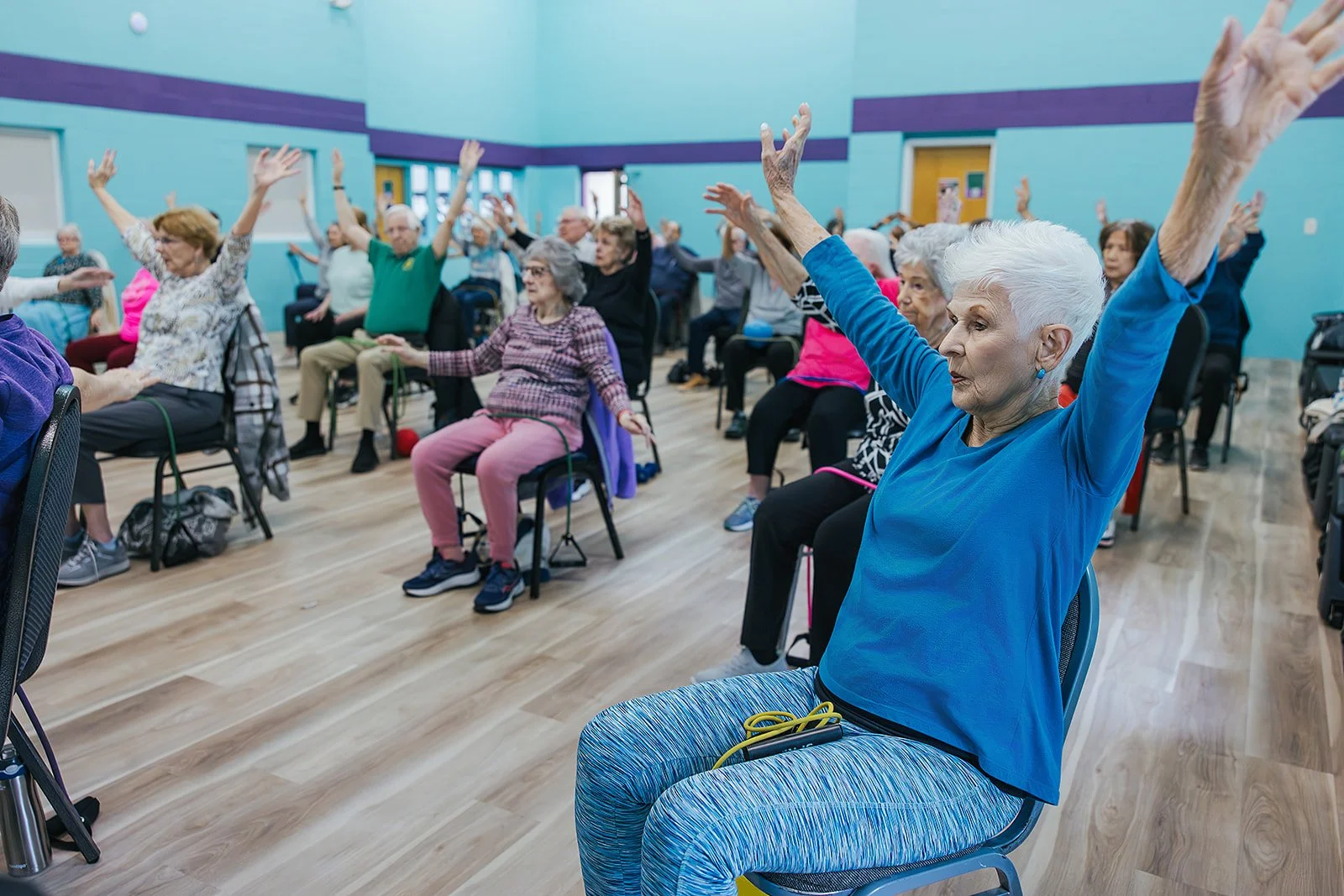 Local business photography session at Durham, NC gym showcases senior exercise class