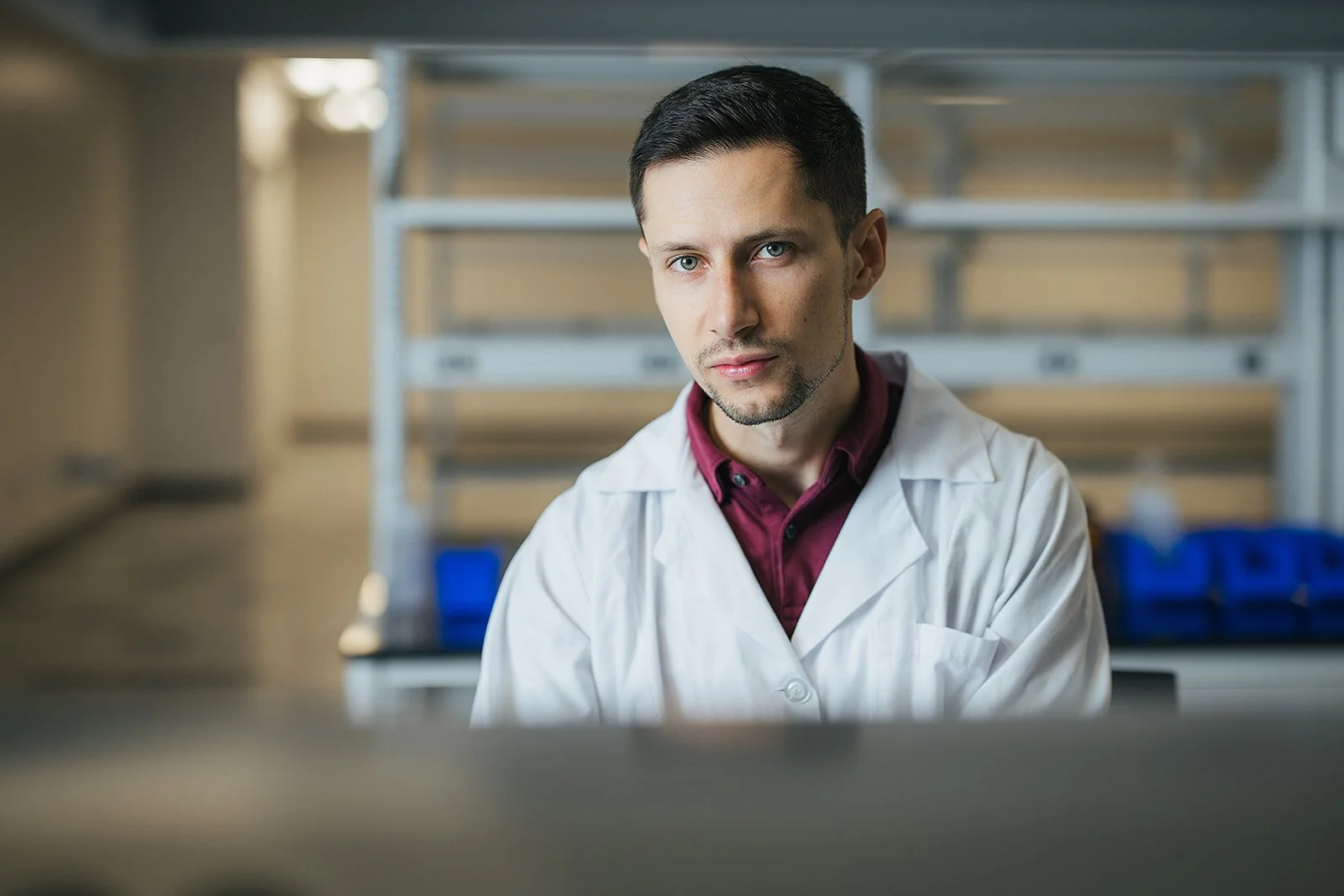 ManInWhiteLabCoatAndRedShirt