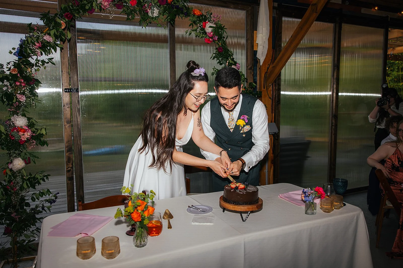 Chapel Hill wedding photographer — couple cutting cake