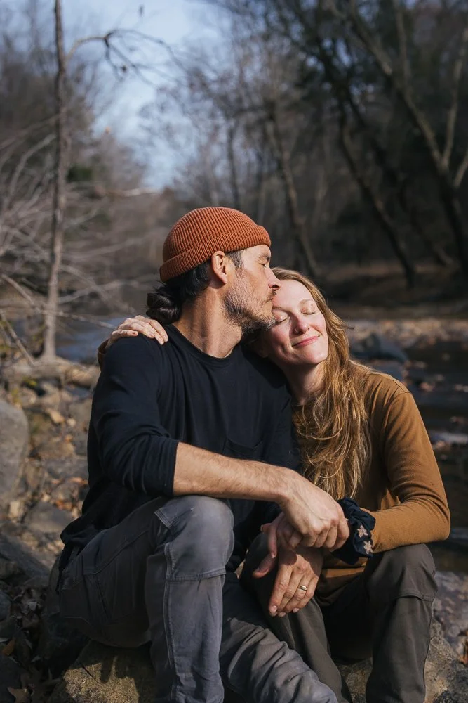 Couple Snuggling Sitting Outside in Durham NC