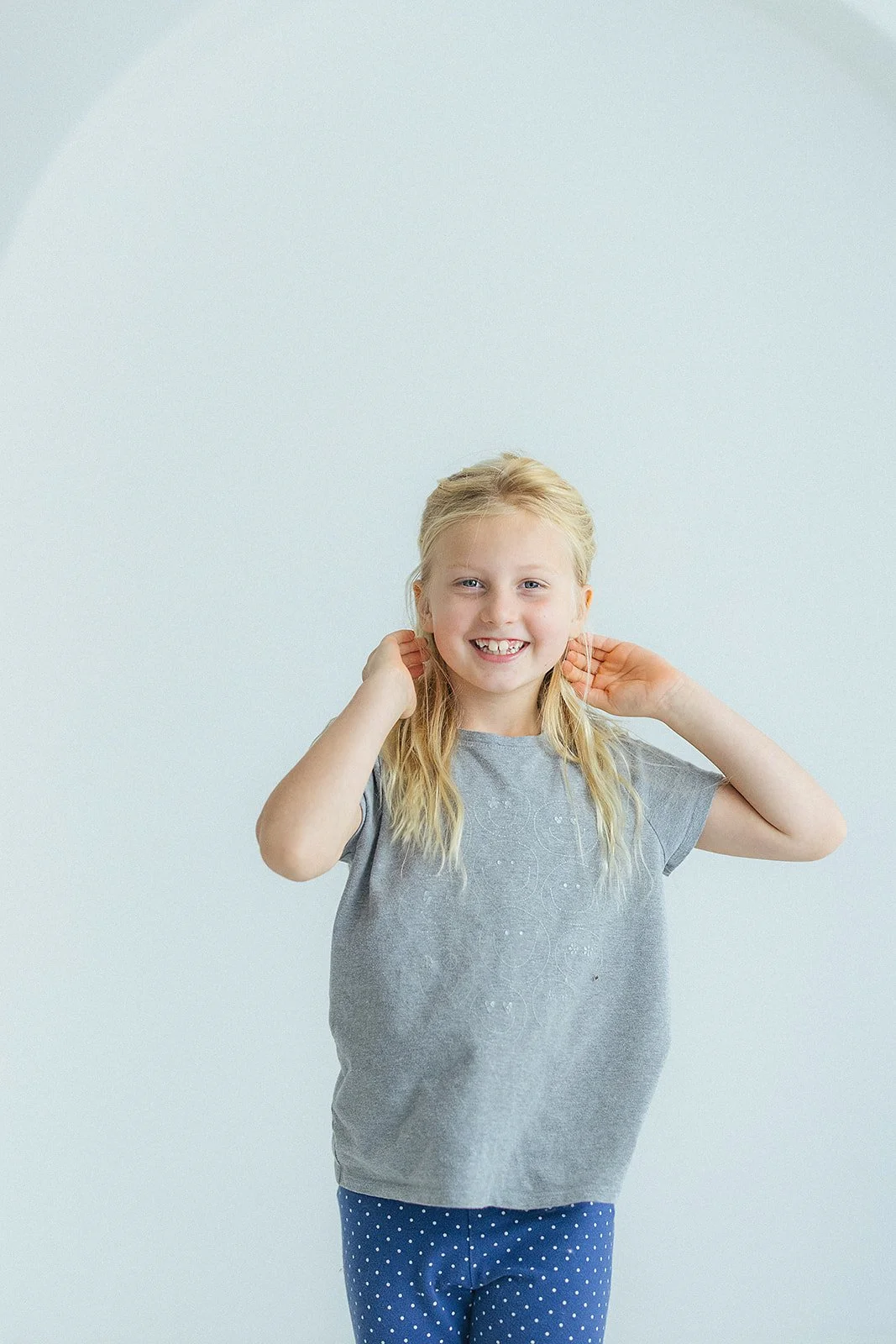 Young Girl Smiling During Studio Portrait Session