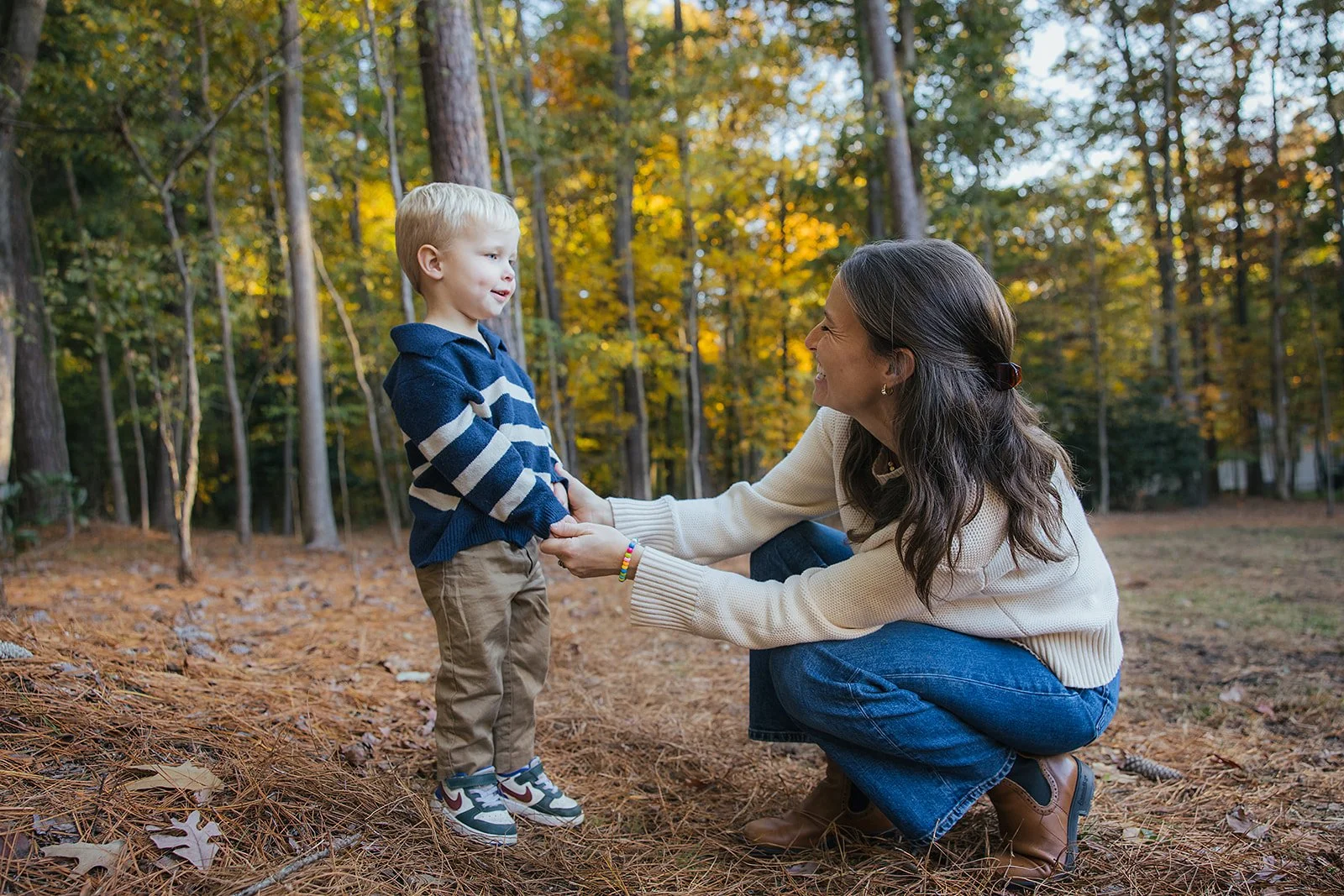 MomWithYoungSonInWoodsFamilyPhotoSessionChapelHillNC